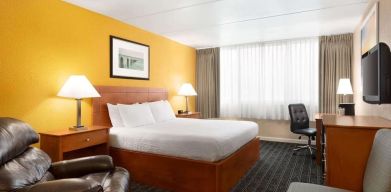 Spacious king room with work desk at Days Inn Miami International Airport,