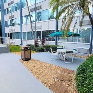 Outdoor garden and terrace at Days Inn Miami International Airport,