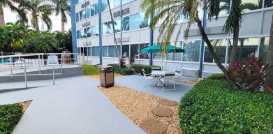 Outdoor garden and terrace at Days Inn Miami International Airport,