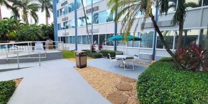 Outdoor garden and terrace at Days Inn Miami International Airport,