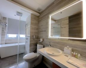 Private bathroom with shower at Fraser Place Puteri Harbour.