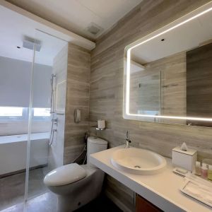 Private bathroom with shower at Fraser Place Puteri Harbour.