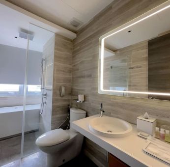 Private bathroom with shower at Fraser Place Puteri Harbour.