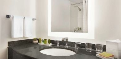 Guest bathroom with shower at Hilton Scottsdale Resort & Villas.