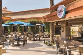 Sunny outdoor terrace at Hilton Scottsdale Resort & Villas.