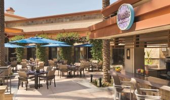 Sunny outdoor terrace at Hilton Scottsdale Resort & Villas.