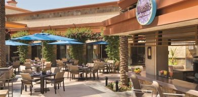 Sunny outdoor terrace at Hilton Scottsdale Resort & Villas.