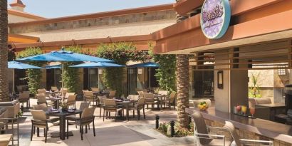 Sunny outdoor terrace at Hilton Scottsdale Resort & Villas.