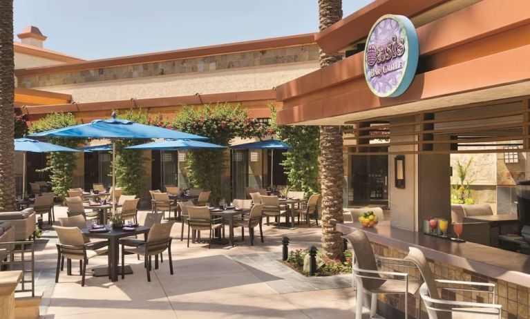 Sunny outdoor terrace at Hilton Scottsdale Resort & Villas.