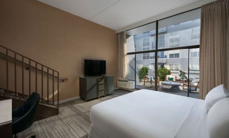 Spacious king room with balcony at Hotel Dena, Pasadena Los Angeles.