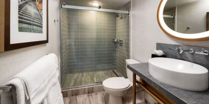 Guest bathroom with shower at Hotel Dena, Pasadena Los Angeles.