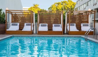 Pool cabanas and pool chairs at Hotel Dena, Pasadena Los Angeles.