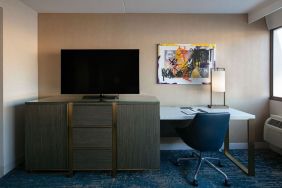 King room with TV and work station at Hotel Dena, Pasadena Los Angeles.