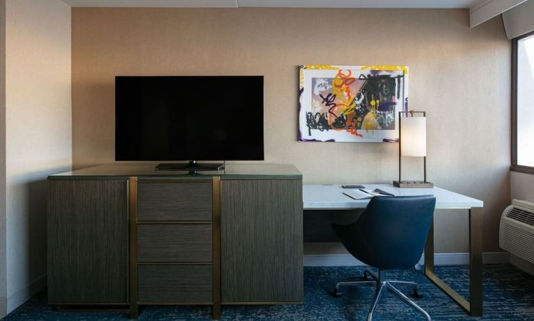 King room with TV and work station at Hotel Dena, Pasadena Los Angeles.