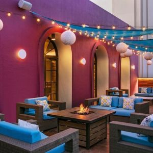 Coworking space, lounge, and fire pit at Hotel Dena, Pasadena Los Angeles.