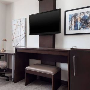 Day use room with TV and work station at Fairfield Inn & Suites By Marriott New York Staten Island.