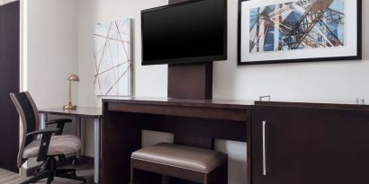 Day use room with TV and work station at Fairfield Inn & Suites By Marriott New York Staten Island.