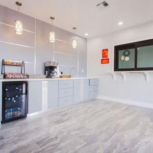 Kitchen and dining area at Palace Inn I-10 West & Beltway 8.