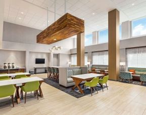 Lounge and coworking space at Hampton Inn & Suites Miami Kendall.