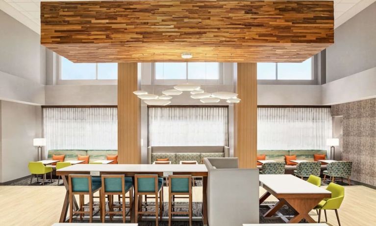 Meeting space and coworking area at Hampton Inn & Suites Miami Kendall. 