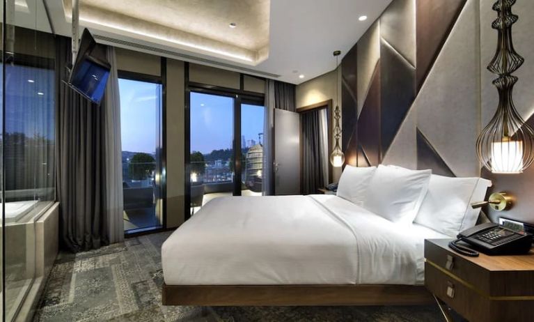 Stunning king suite with large windows at DoubleTree By Hilton Istanbul - Piyalepasa.