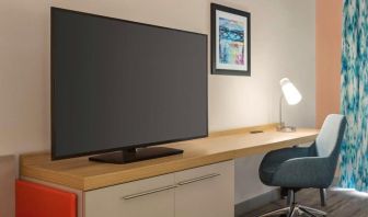 Delux king room with TV and work desk at Hilton Garden Inn Nashville West End Avenue.