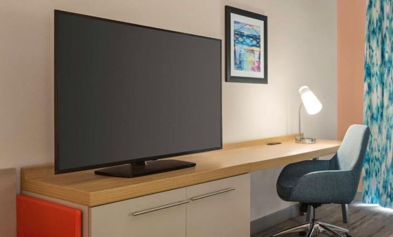 Delux king room with TV and work desk at Hilton Garden Inn Nashville West End Avenue.