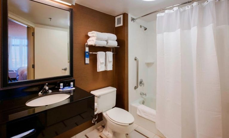 Guest bathroom with shower and bath at Fairfield Inn East Rutherford Meadowlands.