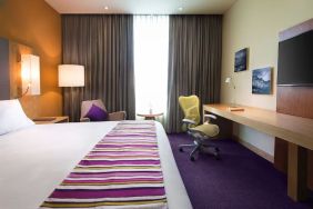 Spacious king room with natural light at Hilton Garden Inn Monterrey Airport, Nuevo Leon, Mexico.