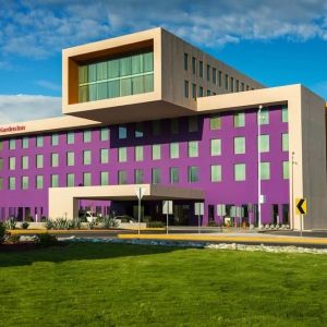 Hotel exterior and parking at Hilton Garden Inn Monterrey Airport, Nuevo Leon, Mexico.