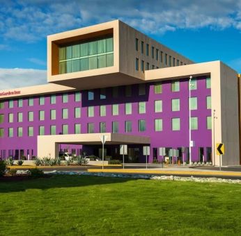 Hotel exterior and parking at Hilton Garden Inn Monterrey Airport, Nuevo Leon, Mexico.