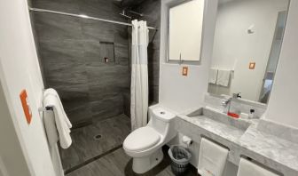 Guest bathroom at Hotel Star Express Puebla.