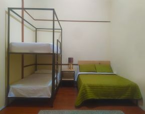 Quadruple room at Casa María Hostal.