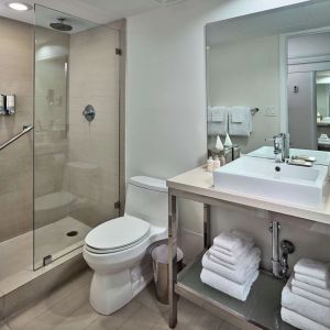 Guest bathroom with shower at Sonesta Fort Lauderdale Beach.