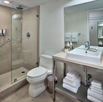 Guest bathroom with shower at Sonesta Fort Lauderdale Beach.