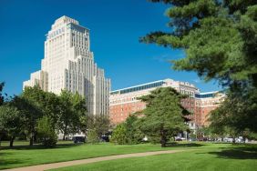 Hotel exterior with garden at The Chase Park Plaza Royal Sonesta St. Louis.