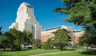 Hotel exterior with garden at The Chase Park Plaza Royal Sonesta St. Louis.