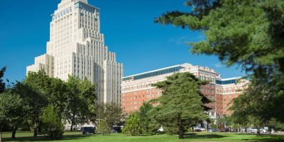 Hotel exterior with garden at The Chase Park Plaza Royal Sonesta St. Louis.