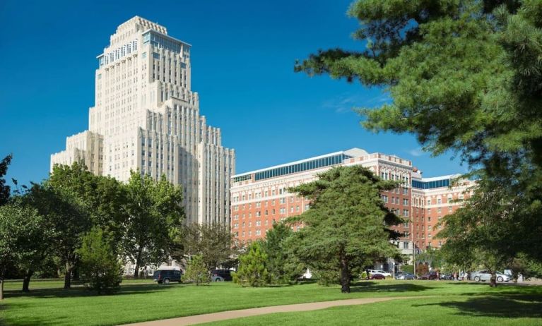 Hotel exterior with garden at The Chase Park Plaza Royal Sonesta St. Louis.