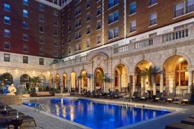 Outdoor pool at night at The Chase Park Plaza Royal Sonesta St. Louis.