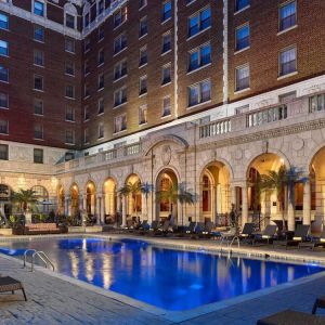 Outdoor pool at night at The Chase Park Plaza Royal Sonesta St. Louis.