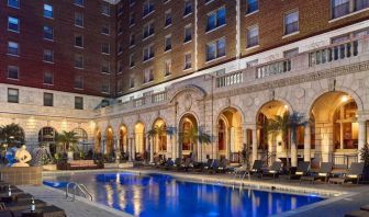 Outdoor pool at night at The Chase Park Plaza Royal Sonesta St. Louis.