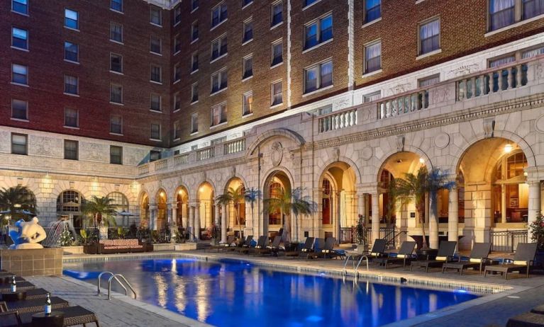 Outdoor pool at night at The Chase Park Plaza Royal Sonesta St. Louis.