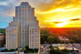 Hotel exterior at sunset at The Chase Park Plaza Royal Sonesta St. Louis.