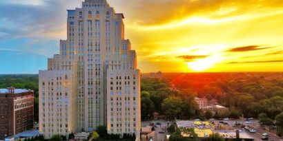 Hotel exterior at sunset at The Chase Park Plaza Royal Sonesta St. Louis.