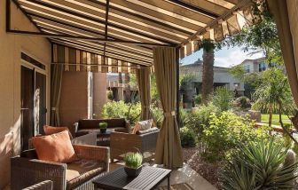 Day room with terrace at Sonesta Suites Scottsdale Gainey Ranch.