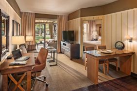 Spacious day room with work station at Sonesta Suites Scottsdale Gainey Ranch.