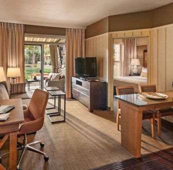 Spacious day room with work station at Sonesta Suites Scottsdale Gainey Ranch.