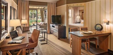 Spacious day room with work station at Sonesta Suites Scottsdale Gainey Ranch.