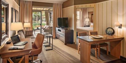 Spacious day room with work station at Sonesta Suites Scottsdale Gainey Ranch.